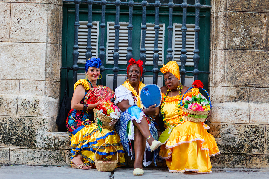 HAVANA, CUBA - JULY 17, 2013: Cuban ladies dressed in typical cl