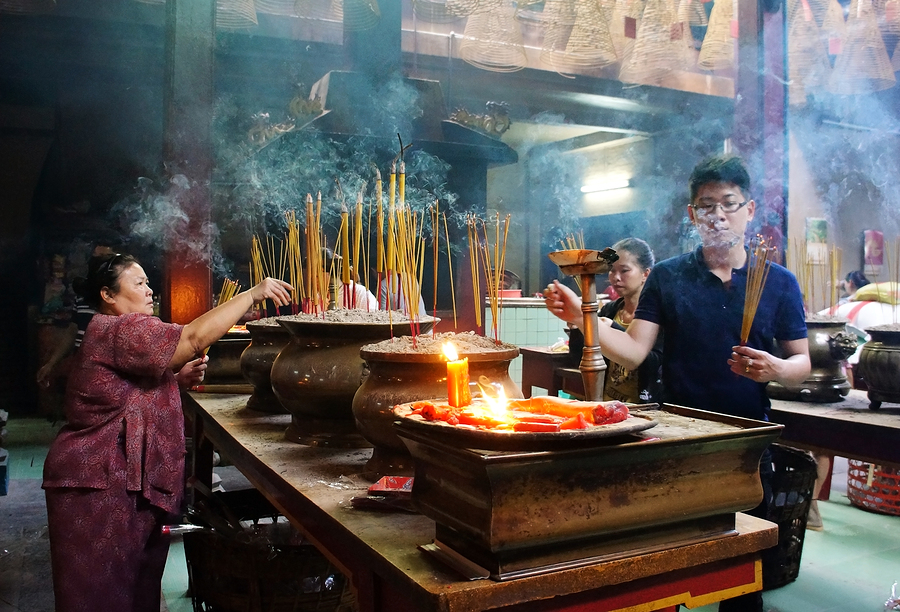 People Burn Incense At Ancient Temple